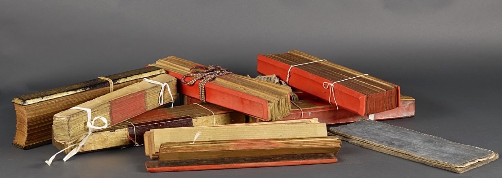 Palm-leaf manuscripts bound between wooden boards
